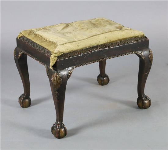 An early 18th century Irish walnut dressing stool, W.2ft 2in. D.1ft 8in. H.1ft 7in.